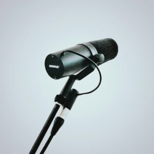 black-and-gray-microphone-on-white-background-9xj2atqmu5w