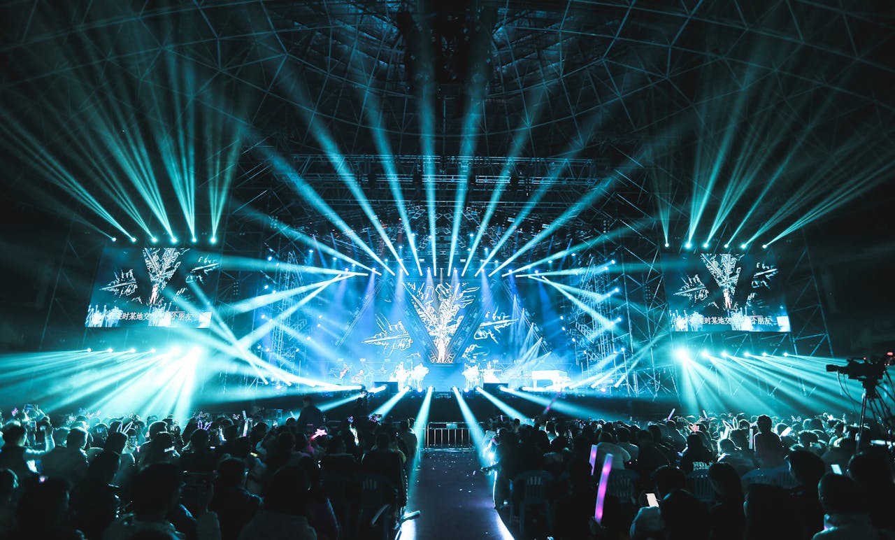 Mastering the First Impression: Your intriguing post title goes here Lively concert scene featuring dazzling stage lights and a large, enthusiastic crowd enjoying the event.